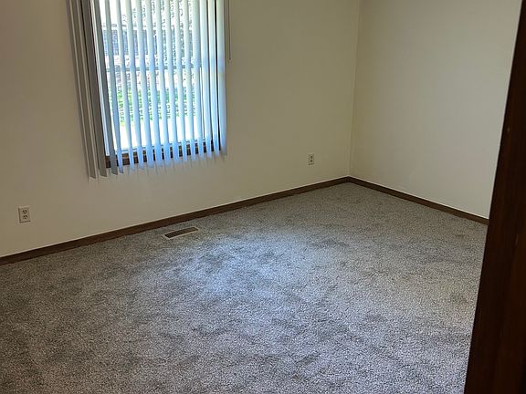Bedroom 1: New carpet throughout