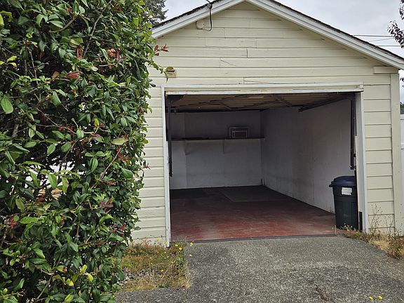 Detached garage for car or extra storage.