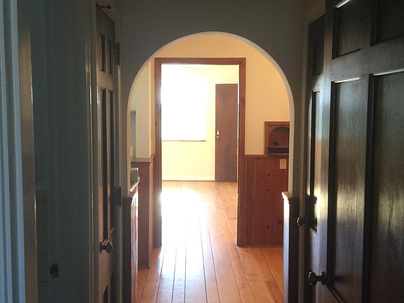 Note the different widths of the hardwood. This is actually the apartment across from the one available - the glare takes away from the beauty of the floors. The ones in the one available are actually more beautiful!
