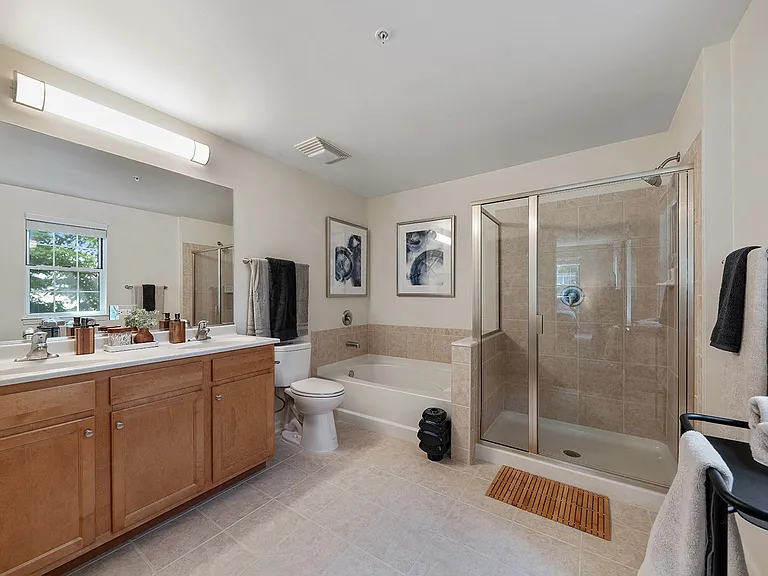 Modern bathroom with soaking tub and glass shower