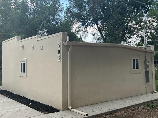 NEW windows, NEW stucco