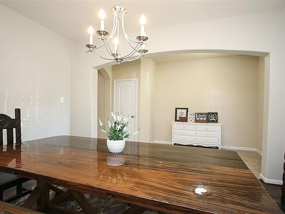 View from the Formal Dining room to the entry and hallway.