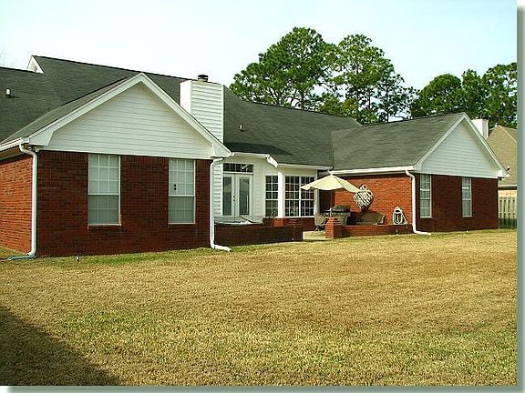 Large fenced backyard. Room for a pool.