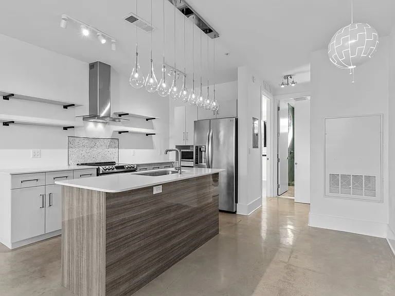 There's room for a breakfast nook in front of the kitchen island.