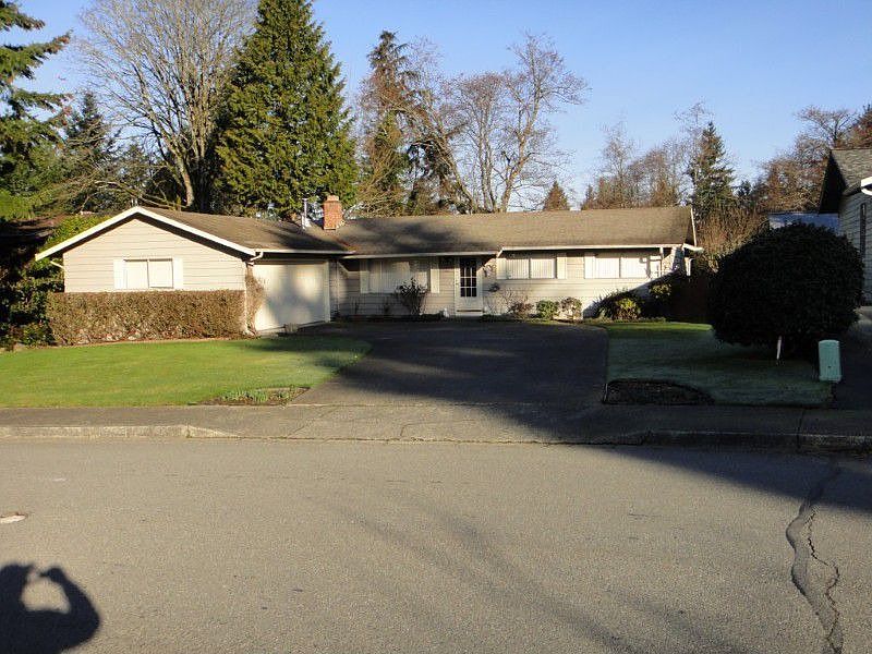 Front of Home from across the street. Very nice level yard. 2-car garage.