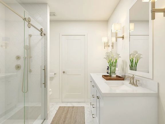 Primary bath with glass shower enclosure