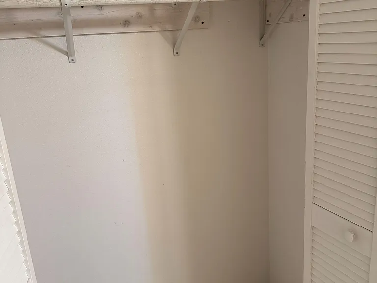 Closet shelf with clothes bar and she
