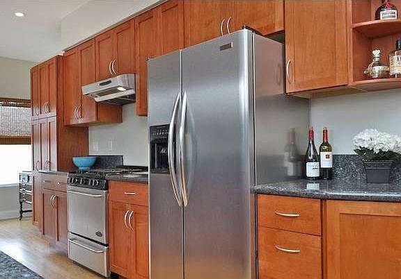 updated kitchen with stainless appliances