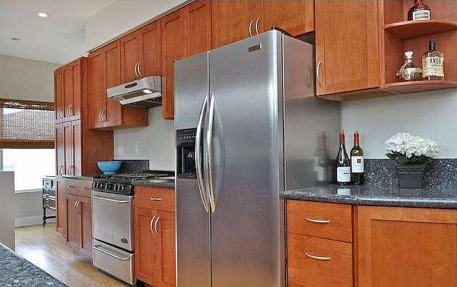 updated kitchen with stainless appliances