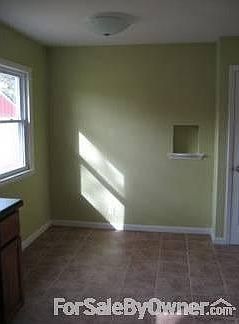 Eat in Kitchen / Dinette : Natural light, tile floor and pantry to the right