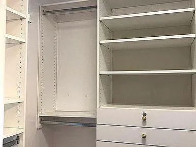 The master contains a walk-in closet with a California Closet system.