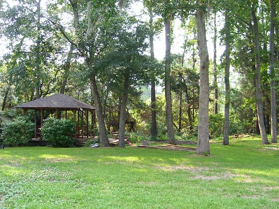 Park Like Backyard with Gazebo and Deck