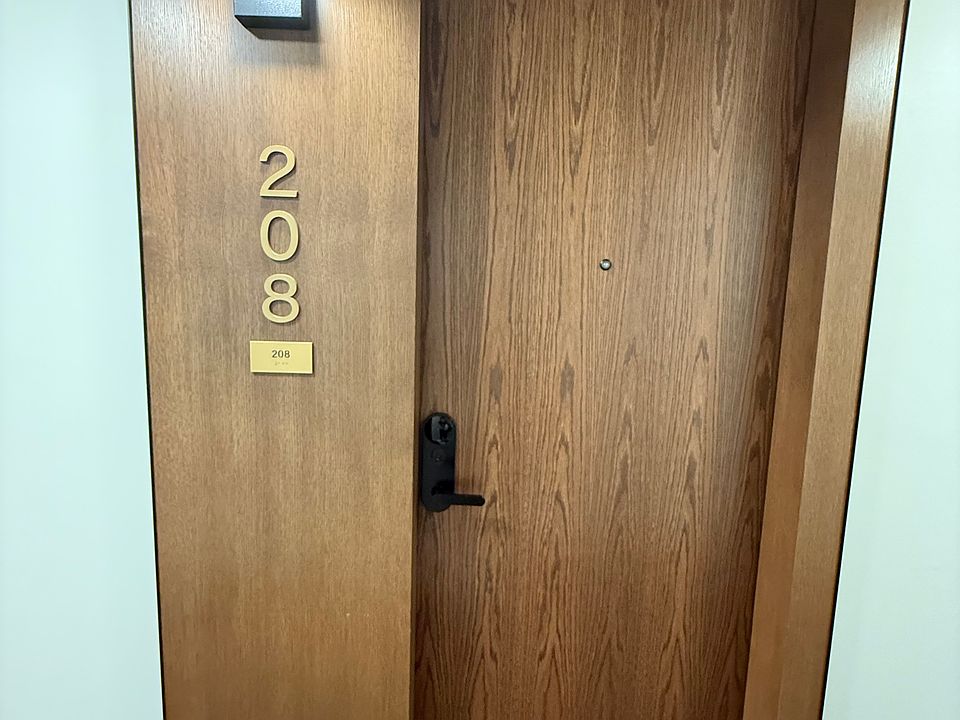 Door to Unit 208.