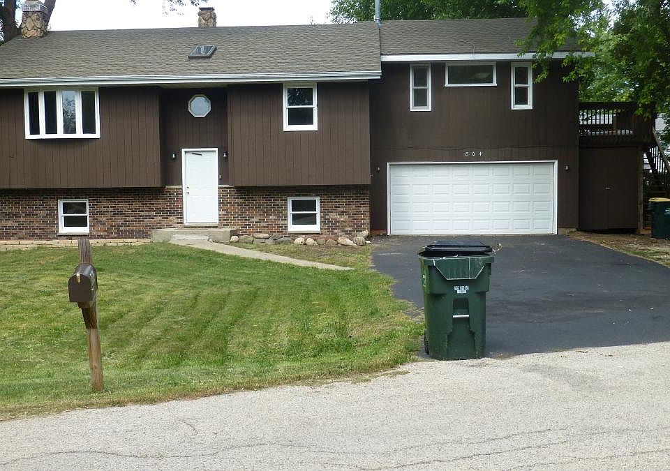 Front of house with 2 car attached garage