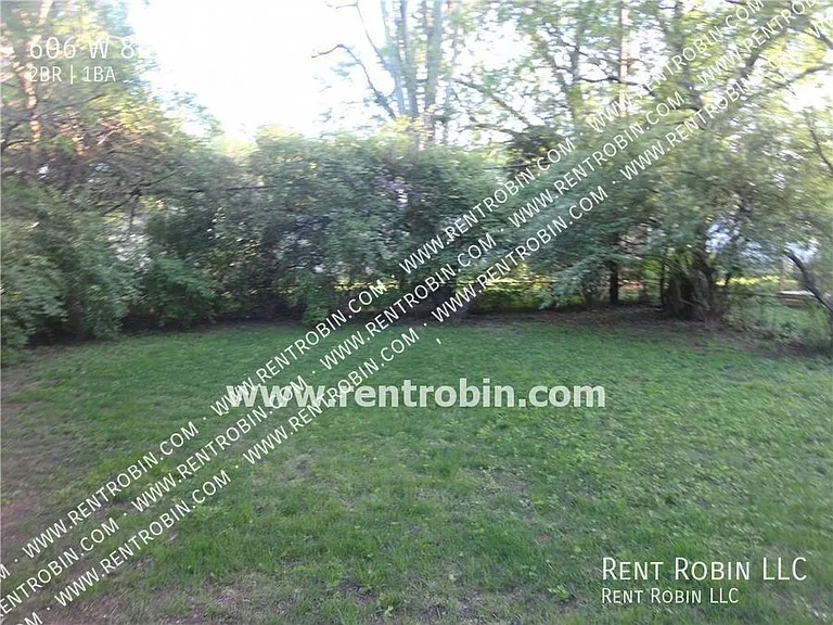 606 W 86th Ter — Photo 9