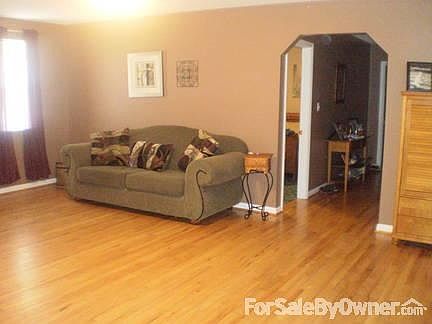 Living Room
						:
						Hardwood floors throughout living room and hallway