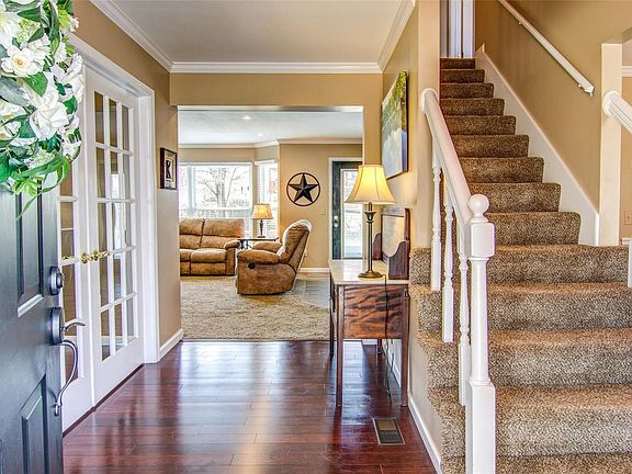 Large 11x6 Entry with wood flooring welcome you inside....