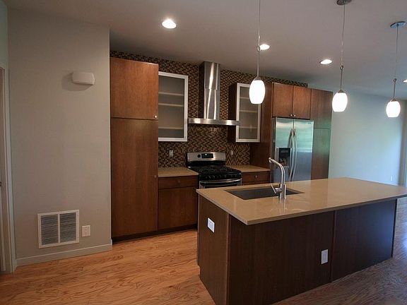 Updated kitchen with island seating.