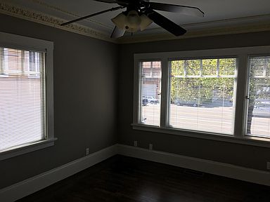Bedroom, left side. Double pane wood windows.