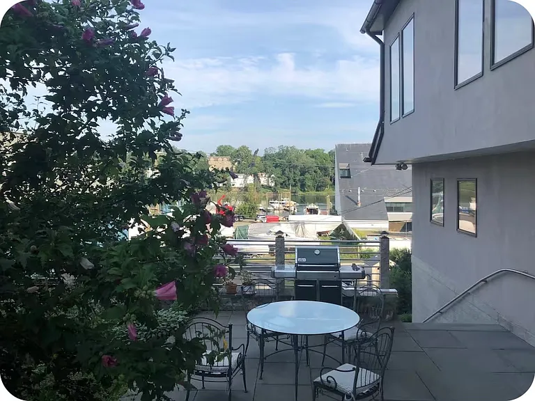 patio and water view on the Mianus river