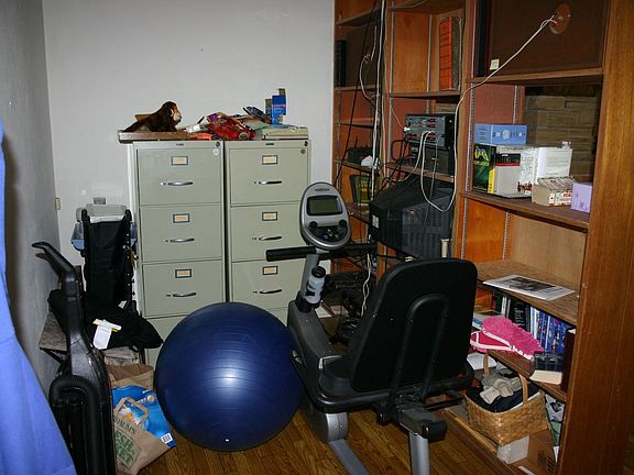 This office area behind the den is a perfect computer niche.