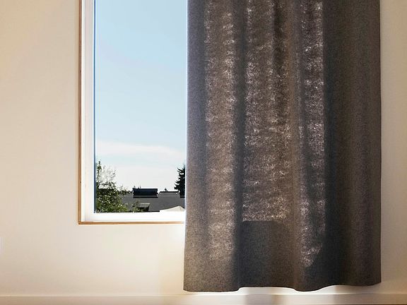 Floor-to-ceiling wool felt curtains
