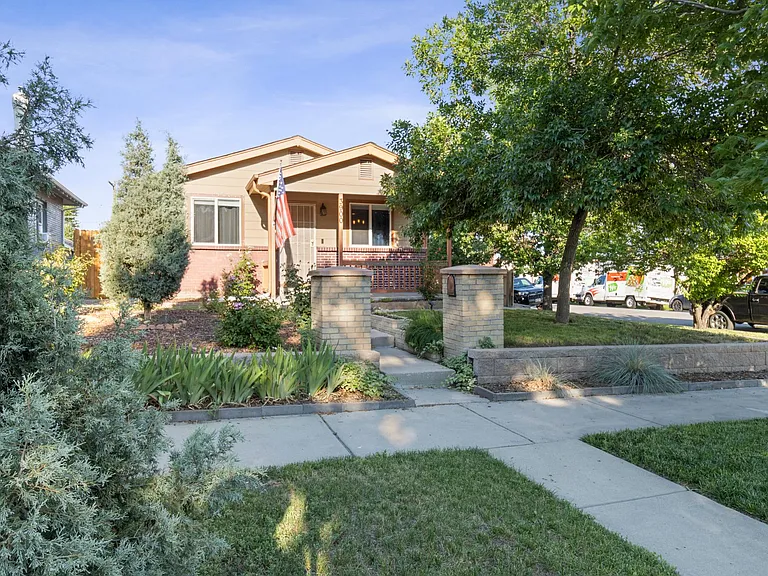 Front of the home on corner with tons of street parking!