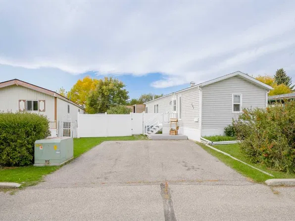 105 Heritage Dr, Okotoks, AB T1S 1M4