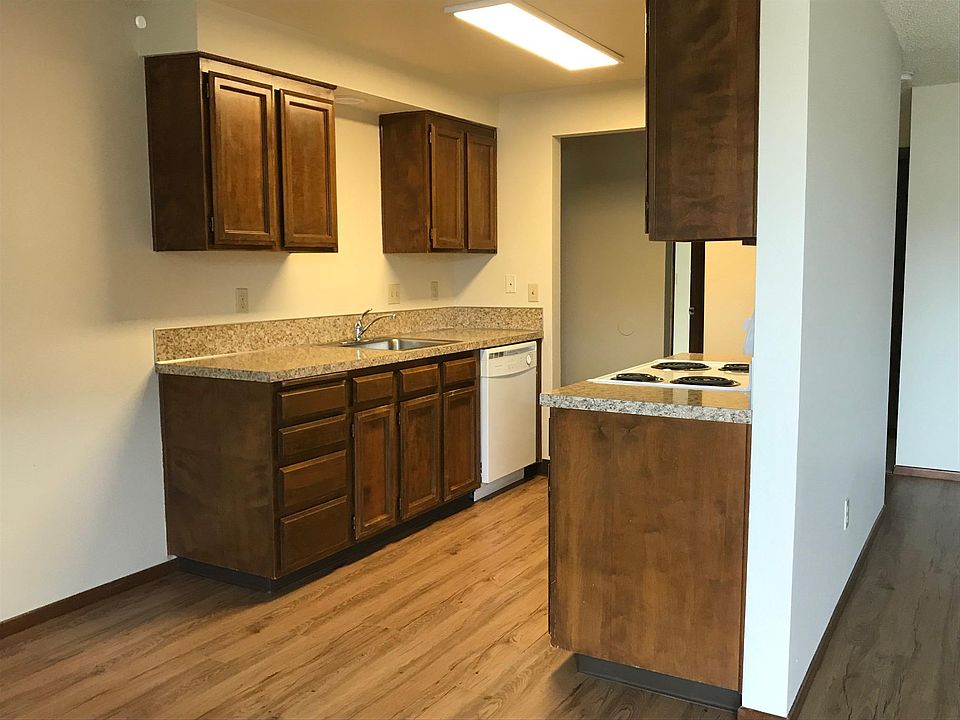 Pass through kitchen with new oven and dishwasher.