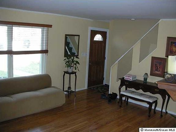 Living Room with F/P & Hardwood Floor