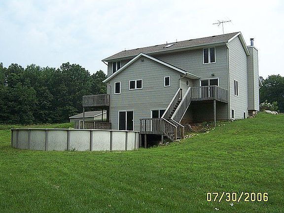 back of house facing pond