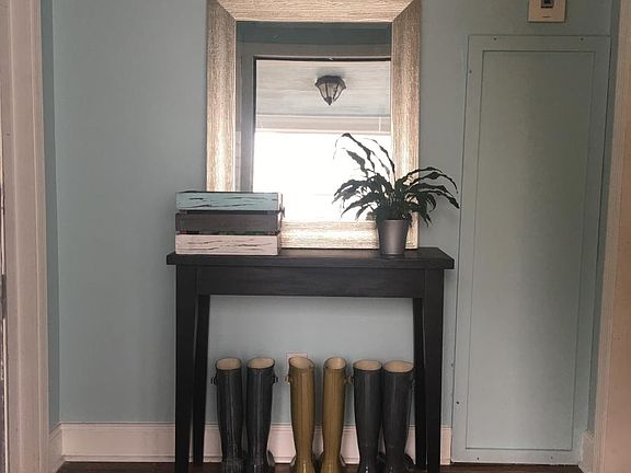 A charming foyer greets you upon entry