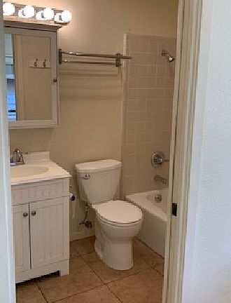 Bathroom with washer & dryer.