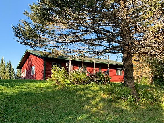 Back of house from the pond.
