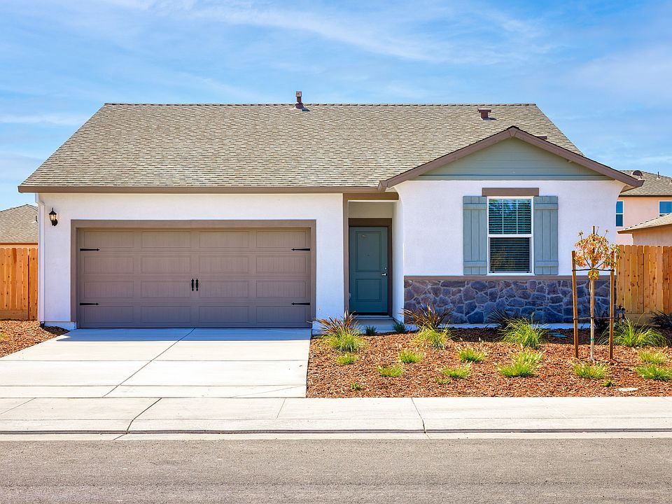 The Baker is a beautiful home with stone and stucco.