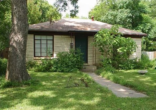 It all starts with a charming Mid-Century stone exterior. But don't let looks deceive you, it is bigger and more modern than it might appear from the curb.