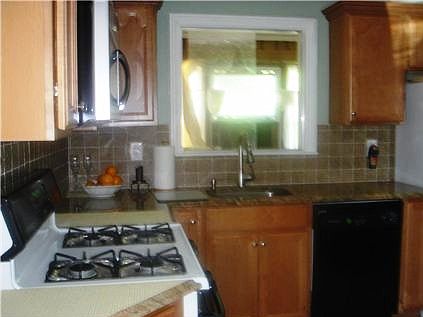 Kitchen looking in to Sun room