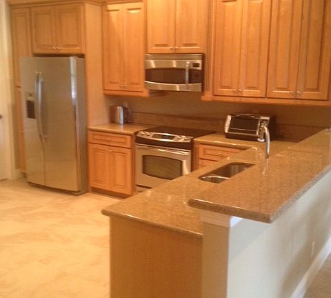 Maple Cabs & Granite.