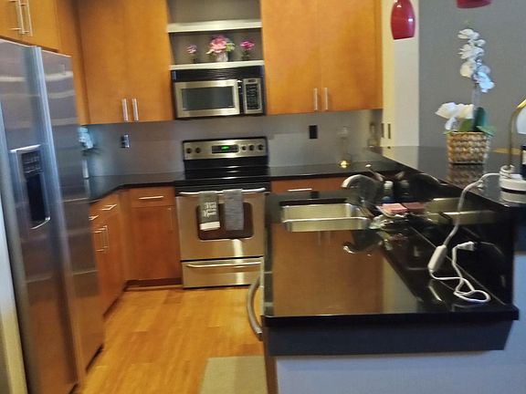 Modern kitchen with stainless steel appliances