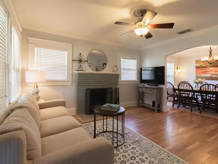photos from previous Airbnb listing. 
Flooring is now LVP