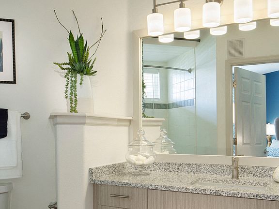 Bathrooms include undermount sinks and premium granite countertops