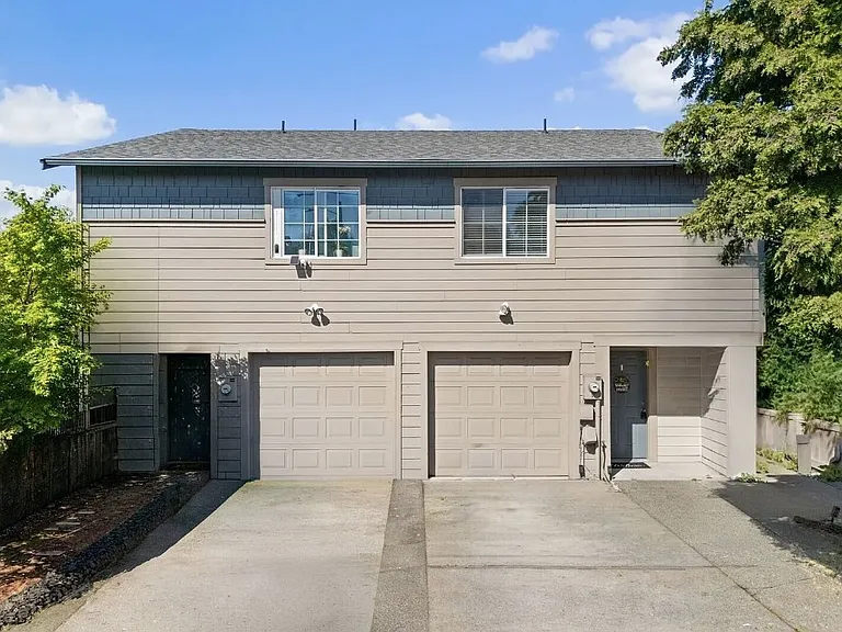 Attached garage & private driveway