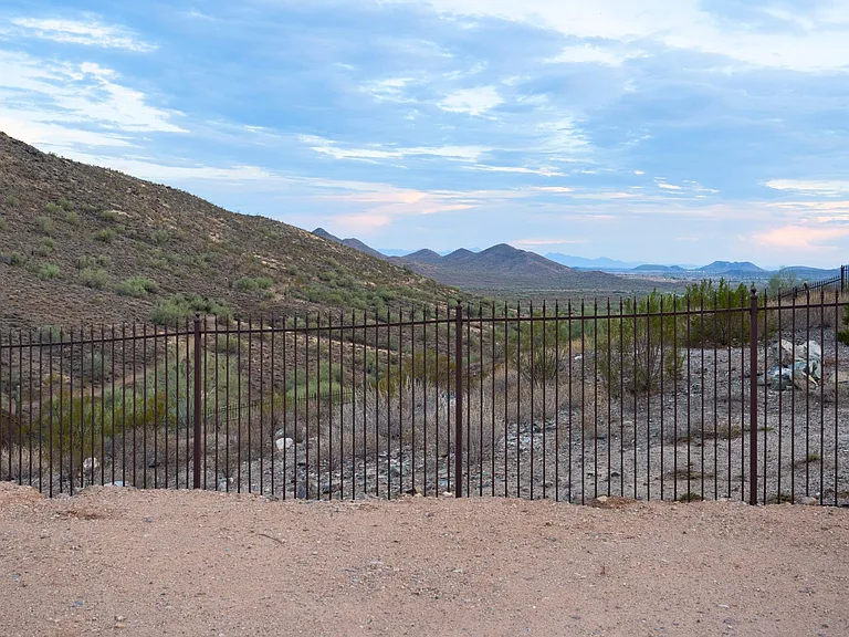 Backyard View of AZ Cardinals Stadium between mountains
