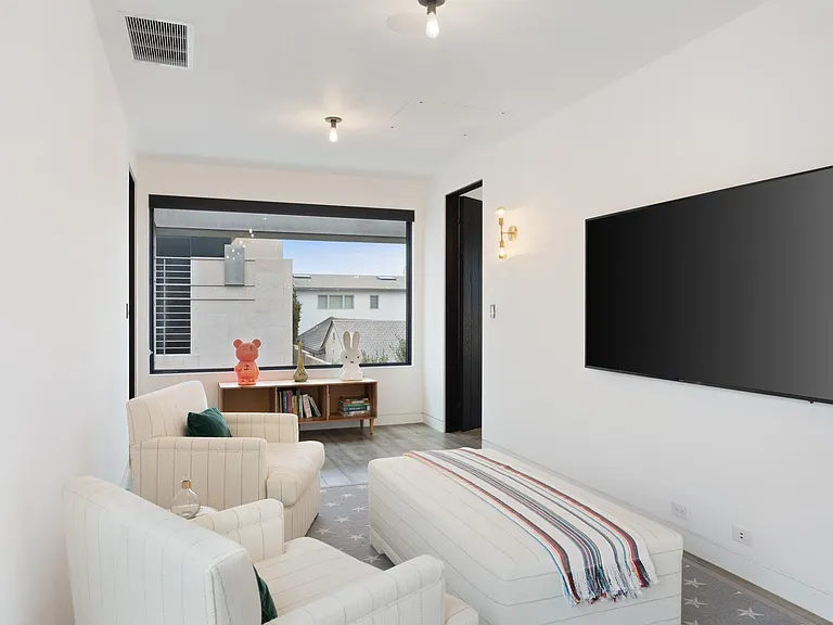 Sit back and unwind in front of the flat-screen TV.