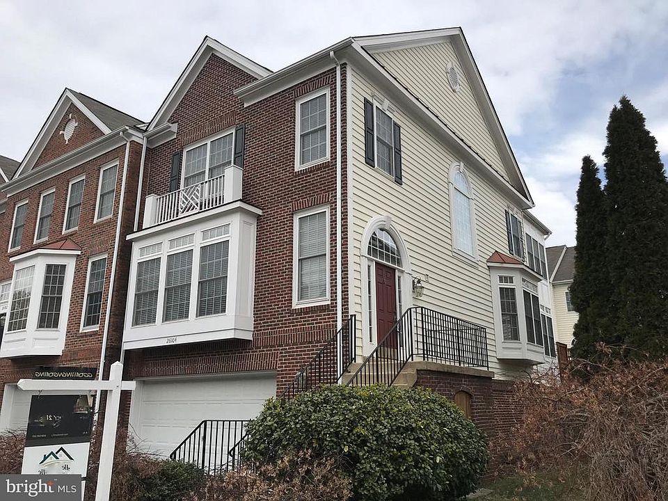 Lovely brick-front end unit with 2 car garage