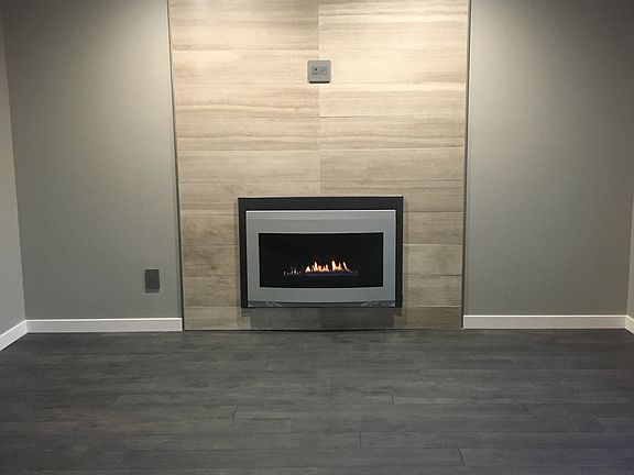 Gas fireplace with limestone