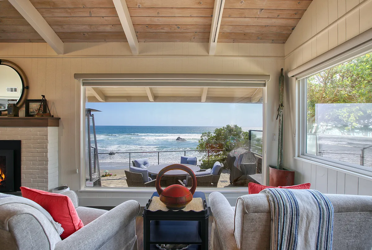 Front-row ocean views from the deck. The perfect spot to pivot between the conversation and the coastline. - 3142 Studio Dr