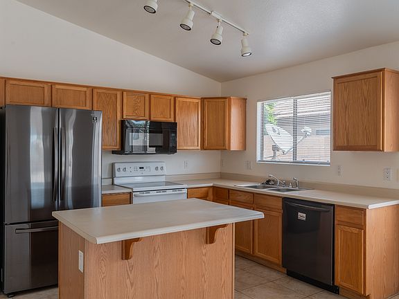 4th image of 16215 W Port Royale Ln