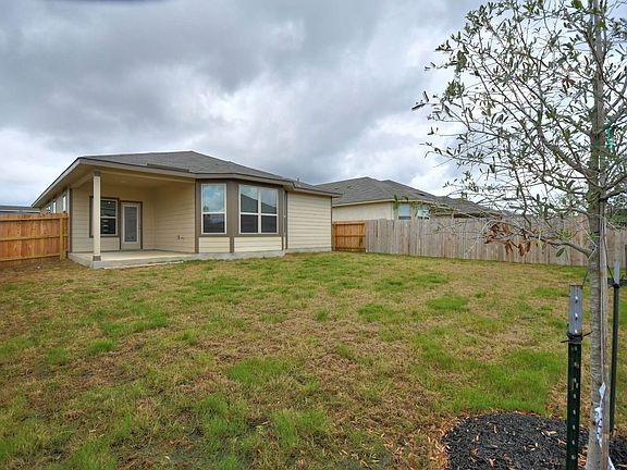 Back exterior of the San Saba floorplan at a Meritage Homes community.