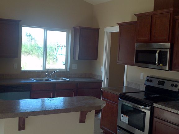 Kitchen with vaulted ceilings